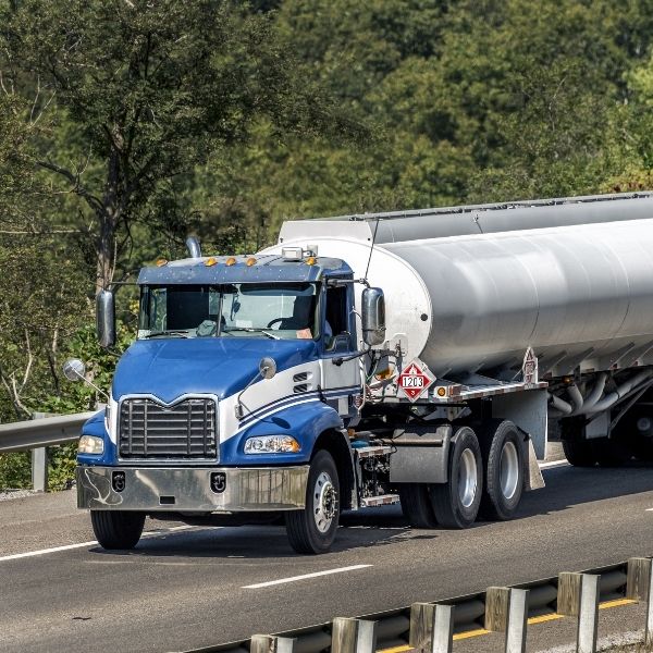 fuel truck driving across bridge