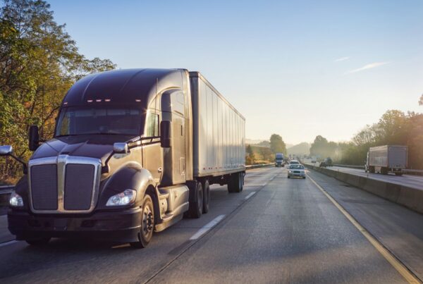 truck driving down highway